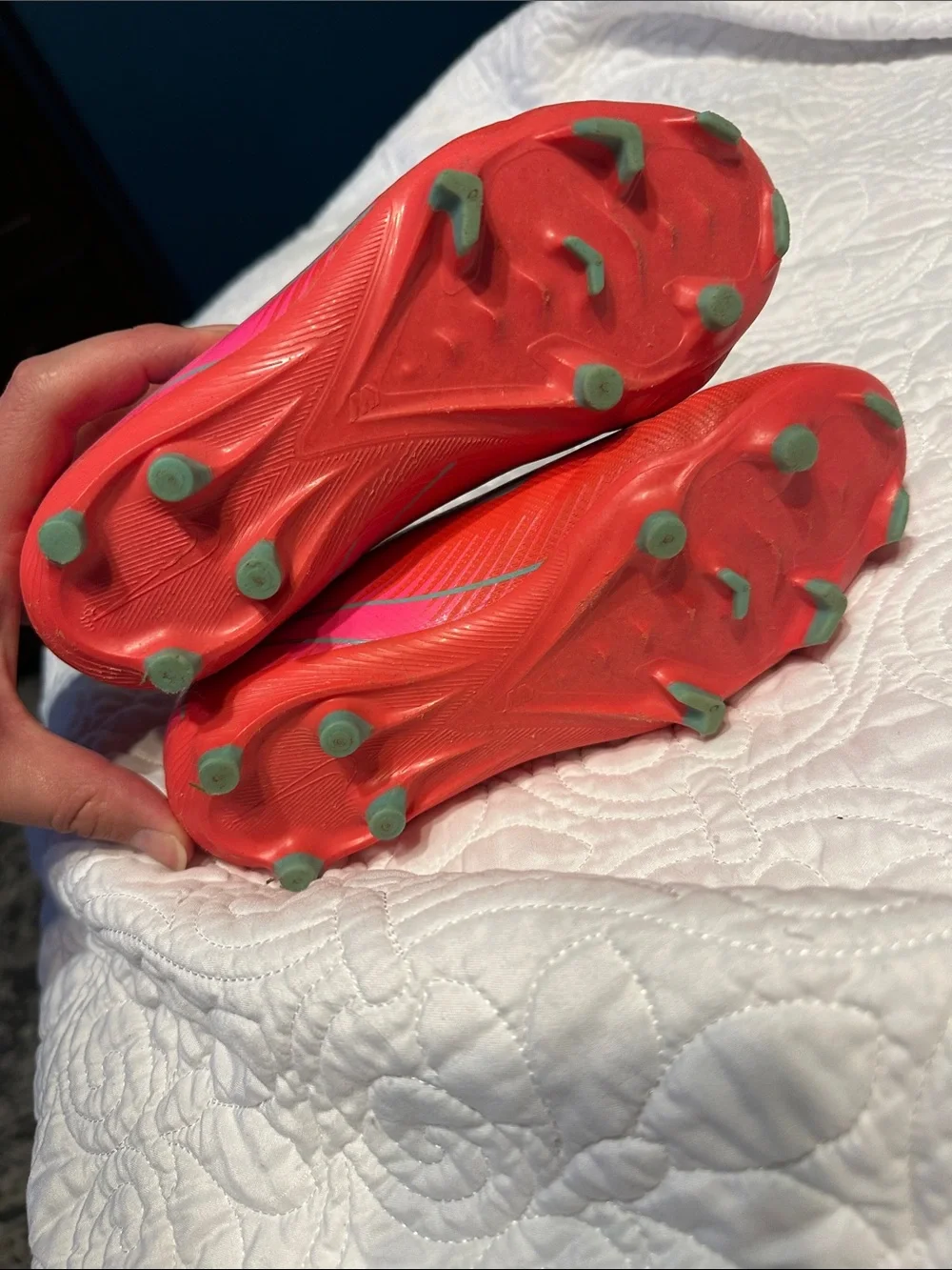 Nike Kids Red Soccer Cleats with Teal Swoosh